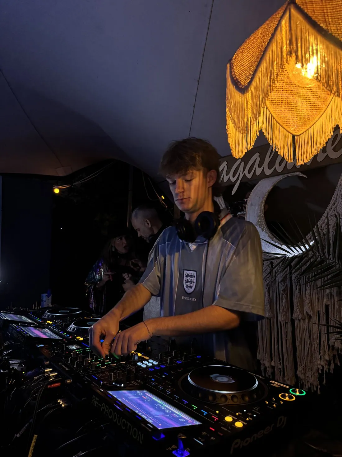 Cam Smith DJing at a night venue